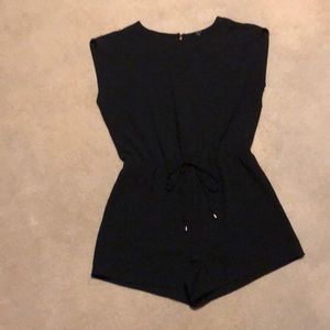 Women’s black one piece shorts jumpsuit